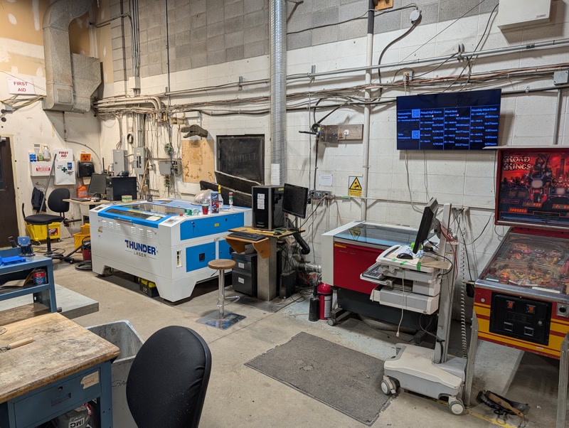 Laser cutting area with a large-format laser cutter