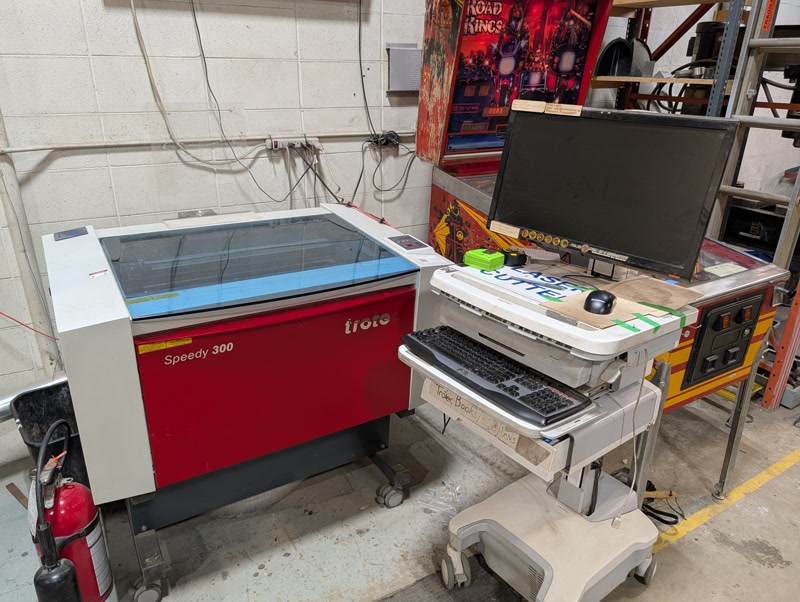 Laser cutter and workstation